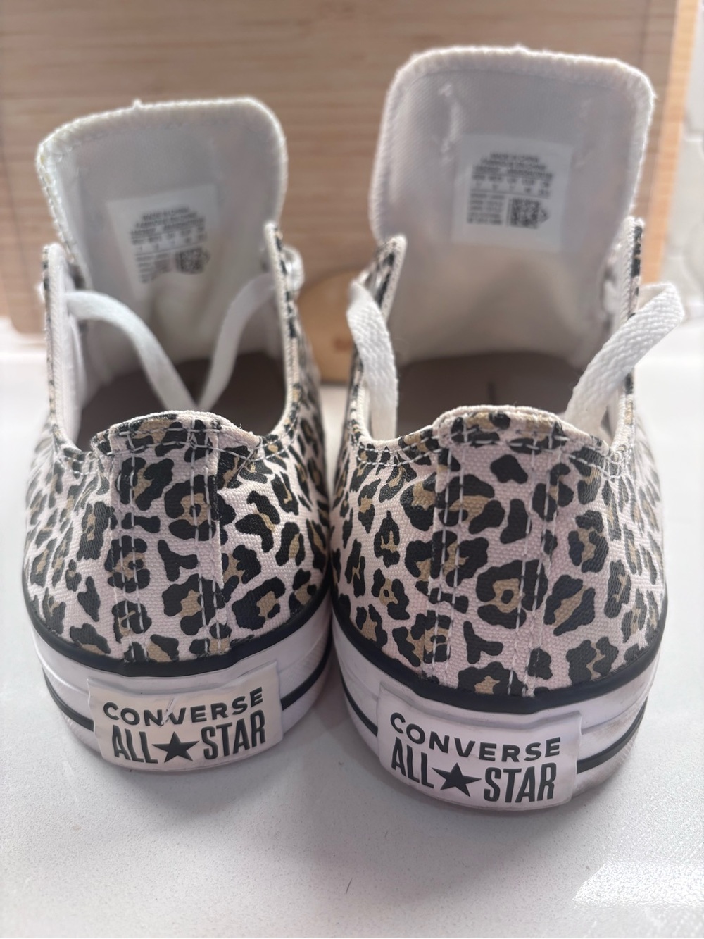 Converse Leopard Print Low Top Sneakers in White, Black, Tan